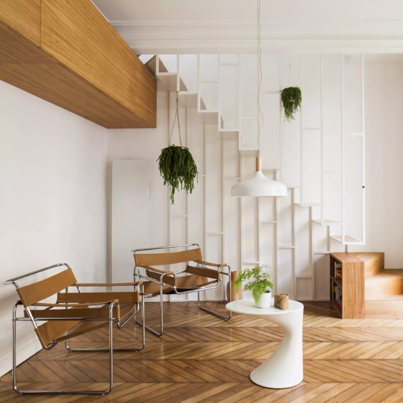Natural parquet on the floor of the first level of a two-story apartment