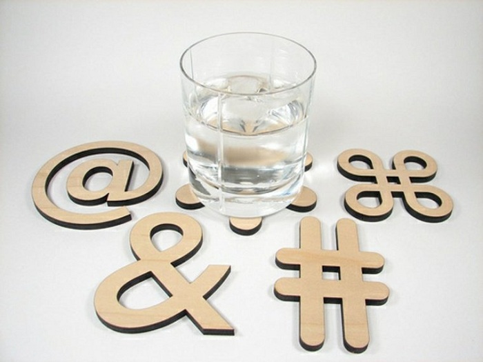 Typographic character hot plate coasters