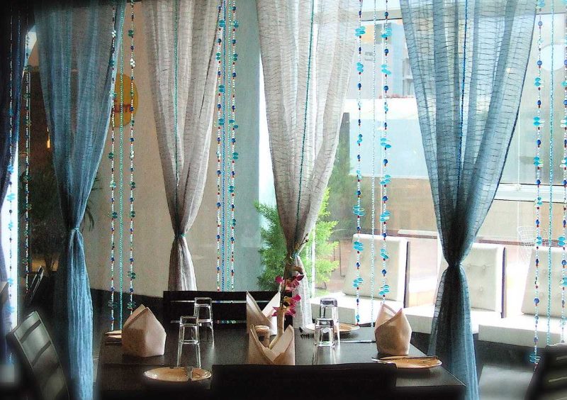Beautifully tied curtains on the living room window
