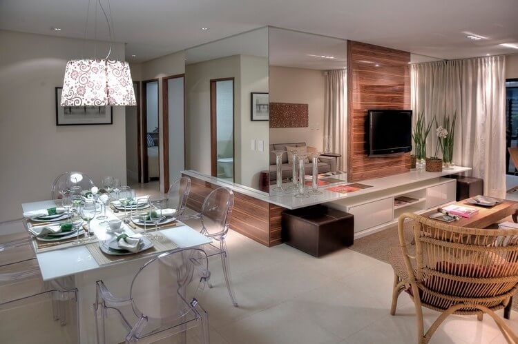 Transparent chairs in the interior of a modern kitchen-living room