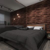 Dark bedspread in the loft bedroom
