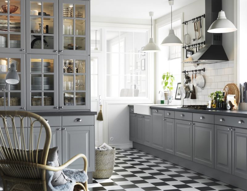 Black and white checkered kitchen floor with gray set.