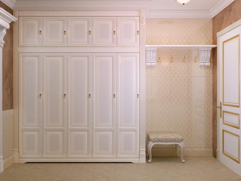 Large classic wardrobe in the interior of the hallway
