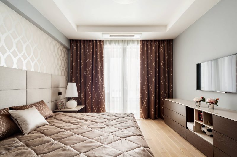 Modern style bedroom with brown curtains