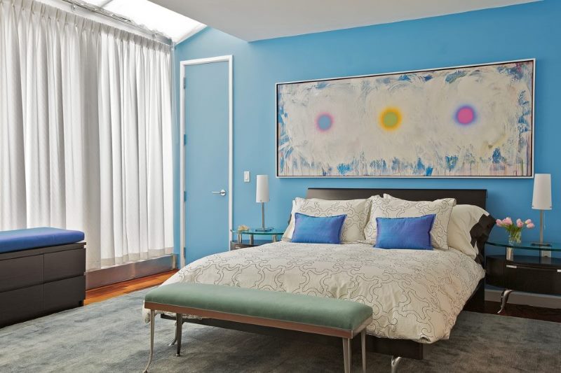 Blue wall in bedroom interior