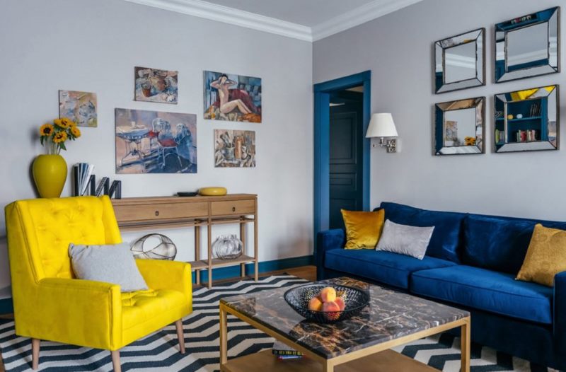 Yellow lounge chair with blue sofa