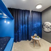 Curtains in the style of the starry sky on the windows of the nursery