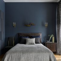 Design of a bedroom in gray-blue tones