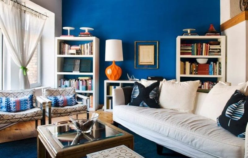 White sofa in the living room with blue floor and wall