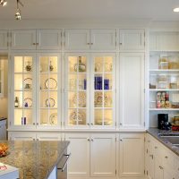 Kitchen cabinets with shelf lighting