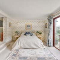 Panoramic window in the bedroom with white floor