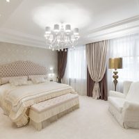 White chandelier on the bedroom ceiling
