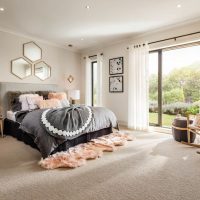 Design of a bedroom with a panoramic window in a private house
