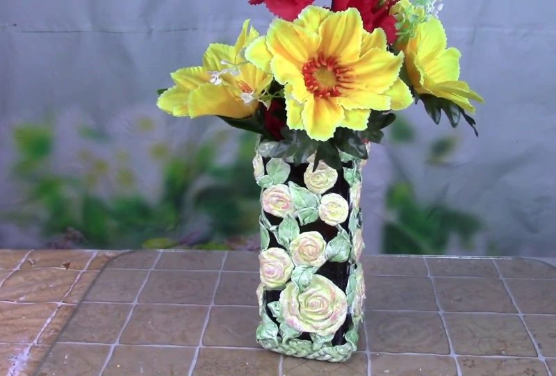 Wine bottle decoration with volumetric flowers