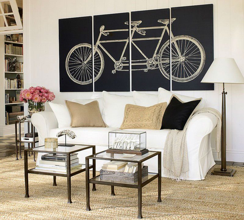 Bicycle on a modular picture in the interior of the living room
