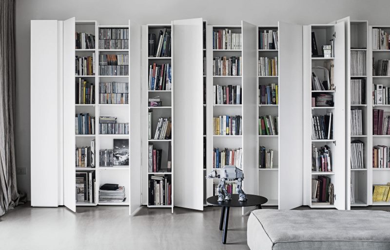 White bookcases with doors