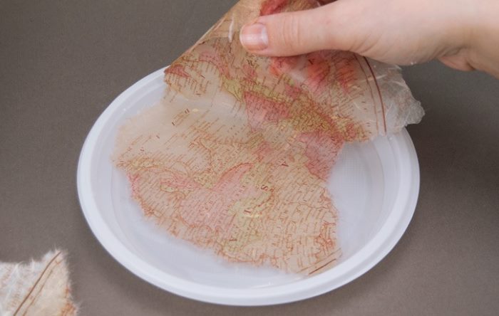 Soaking Rice Paper for Bottle Decor