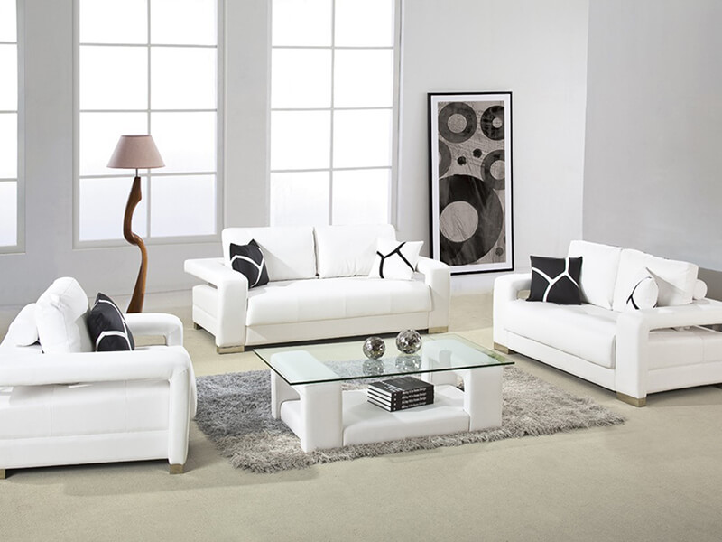 Three white sofas in the living room interior