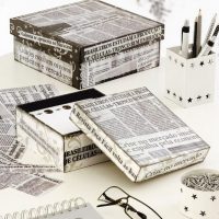 Decor of boxes with old newspapers