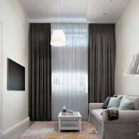 Design a small living room with dark gray curtains