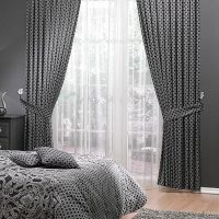 Gray textile in the design of the bedroom.