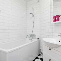 White tile on the bathroom wall