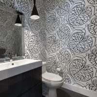 Wallpaper with black ornament on the bathroom wall
