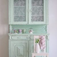 Old turquoise-colored cupboard