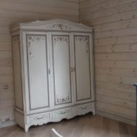 Provence-style wardrobe in the bedroom