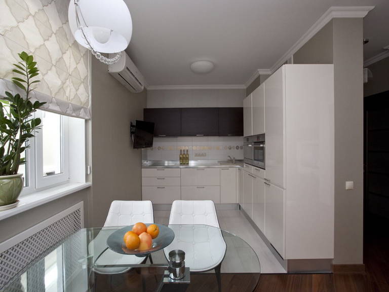 Modern kitchen design with roman blinds