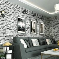 Gray sofa by the living room wall