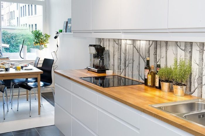 Kitchen design with oak countertop.