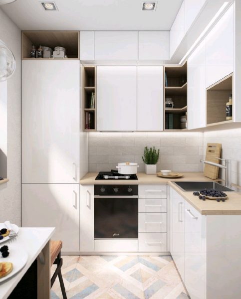L-shaped arrangement (angular) is more successful, since it involves one of the corners and it is possible to accommodate more furniture and appliances.