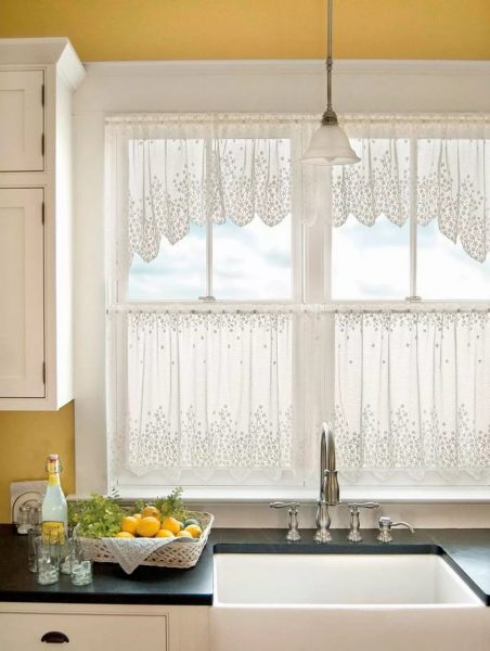 For a small kitchen, it is better to choose miniature curtains