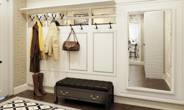 Using white, you can visually expand the boundaries of the hallway, especially if you add a small detail - large mirrors.