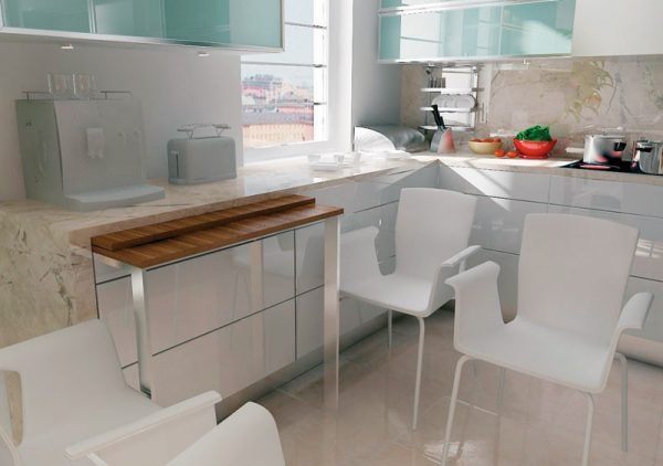 For a small kitchen, the best alternative to a full-fledged table is a retractable additional countertop, which can be cleaned after use