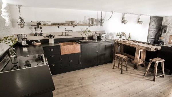 If the kitchen area is simply gigantic, then such a design solution as setting a work area in the center of the room that will resemble the letter r