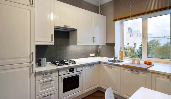 This option is also well suited for a small kitchen, because usually the area near the window is not used at all.